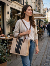 Woman wearing the tote bag crossbody on a cafe street